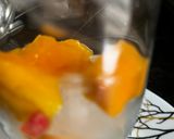 A picture of step 1 of Mango Pomegranate Refreshments.