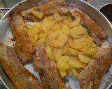 Foto del passaggio 2 della ricetta Puntine di maiale con patate aromatizzate al forno