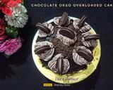 A picture of step 11 of Chocolate Oreo Overloaded Cake.