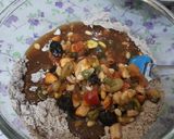A picture of step 6 of Christmas special eggless plum cake.