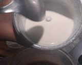 A picture of step 3 of Hershey 's cocoa almond shake.