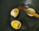 A picture of step 1 of Black Egg Curry.