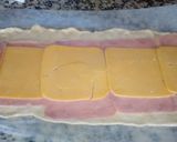 Foto del paso 4 de la receta: Rollo de hojaldre de jamón y queso