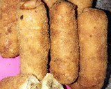 A picture of step 8 of Fishroll with bread crumbs.