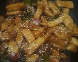 A picture of step 6 of Glaze honey chilli potatoes.