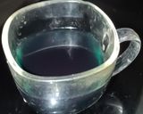 A picture of step 2 of Butterfly pea flower syrup.