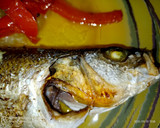 Foto del paso 7 de la receta: Lubina al horno con guarnición🐟🐟🐟🍅🍅🥔🥔🧅🧅
