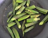 A picture of step 2 of Okra masala with aubergine & sweet potato.