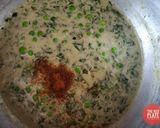 A picture of step 13 of Methi Matar Malai.
