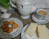 A picture of step 2 of Chicken egg sandwitch with tea.