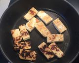 A picture of step 12 of Easy Mango Tofu Red Thai curry.