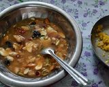A picture of step 2 of Christmas special eggless plum cake.