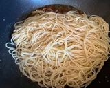 A picture of step 5 of Garlic Noodles with Shrimp.