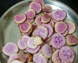 A picture of step 1 of Ratalu(purple yam) ke pakode.