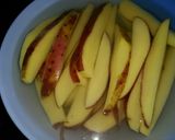 A picture of step 1 of Chatpatay crispy potato wedges.