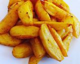 A picture of step 6 of Baked turmeric potato wedges.
