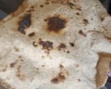 A picture of step 11 of Maharashtrian Lunch Thali of Bhakri, Vangyache Bharit, Phodniche Varan, Gul aani Tup.