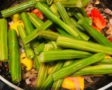 A picture of step 3 of Drumsticks pumpkin sweet sour curry.