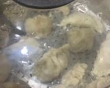 A picture of step 12 of Dumplings served with chilli oil and soya sauce dipping.