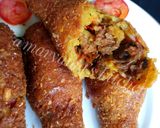 A picture of step 14 of Stuffed sweet potatoe drumsticks.