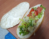 Foto del paso 3 de la receta: Bocadillo de pechuga, lechuga y queso con papas fritas
