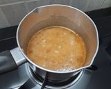 A picture of step 3 of Eggless plum cake.