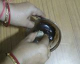 A picture of step 5 of MODAK WITH BANANA & PEANUT DIPPED IN CHOCOlATE.