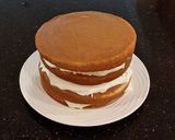 A picture of step 21 of White Peppermint Layer Cake with a White Peppermint Cream.