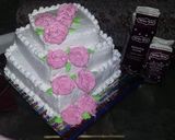 A picture of step 2 of Wedding theme cake.