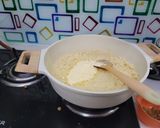 A picture of step 1 of Ashtami Bhog Thali (Halwa, Puri, Kala Chana).