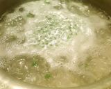 A picture of step 6 of Boiled white rice with green peas 🍚☺.