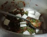 A picture of step 4 of Cholia & Onion Pulao.
