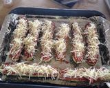 A picture of step 3 of Zucchini Parmesan with Red Sauce.