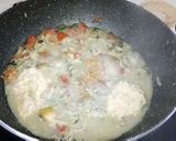 A picture of step 11 of Stuffed clams gravy.
