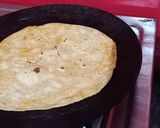 A picture of step 2 of Paratha with raita.
