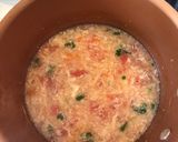 A picture of step 5 of Tomato Eggdrop Soup.