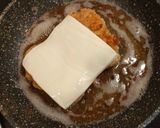 Foto del paso 3 de la receta: Entremuslos empanados con queso