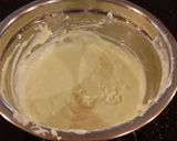 A picture of step 13 of White Chocolate Layer Cake Filled with Strawberry Mousse and Frosted with Whipped Strawberry White Chocolate Ganache.