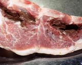 Foto del paso 5 de la receta: Asado, pechito y bondiola de cerdo a la parrilla saborizados