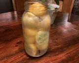 A picture of step 1 of California Farm Lemon Cucumber Pickles.
