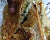 A picture of step 9 of Street style Bread Omlette.