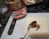 A picture of step 1 of Nuetella and banana french toast roll ups.