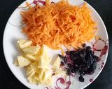 A picture of step 1 of Carrot raisin salad.