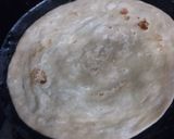 A picture of step 4 of Egg paratha roll.