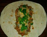A picture of step 9 of Mike's Green Chili Pork Burritos.