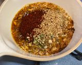 A picture of step 4 of Garlic Chilli Oil with Nuts.