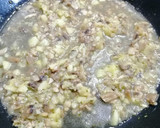 Foto del paso 6 de la receta: Calabacín relleno con pollo y champiñones