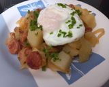 Foto del paso 4 de la receta: Papas con longaniza y cebolla