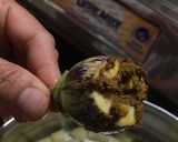 A picture of step 2 of Brinjal in black gravy.