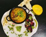 A picture of step 6 of Dal palak.